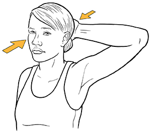 Woman holding hand to back of head doing neck isometric exercise.